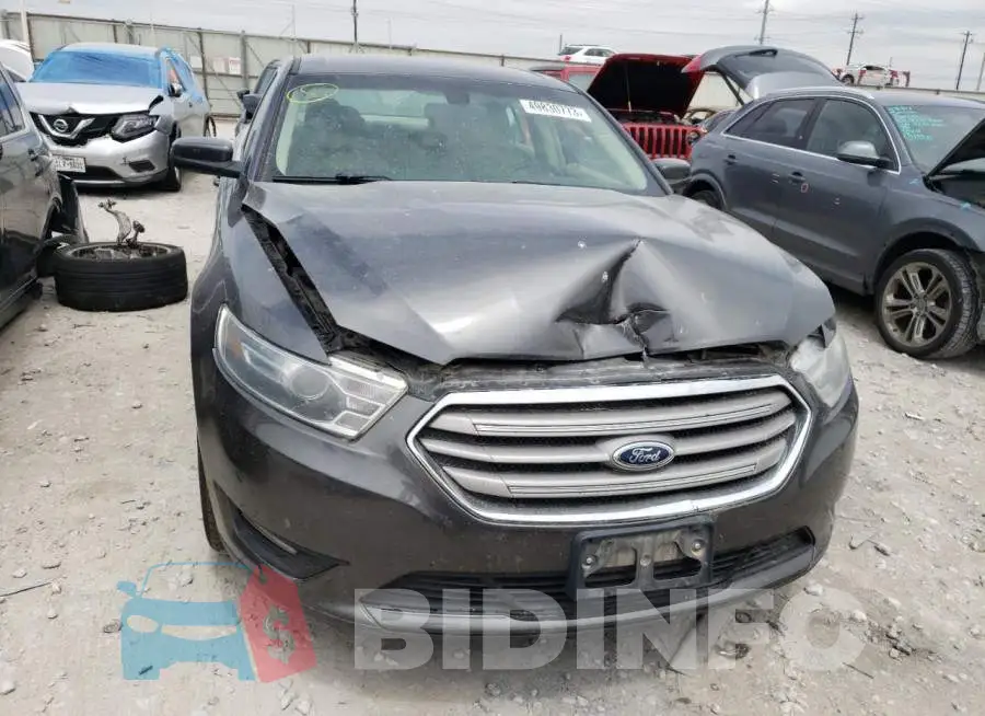 1FAHP2E86FG142268 Photo# 5