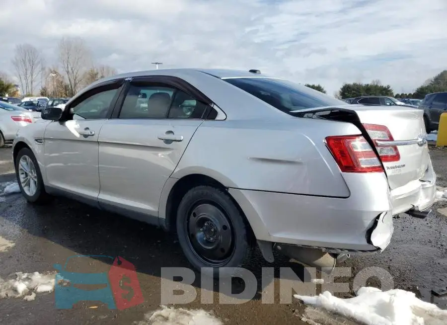 1FAHP2D8XGG132829 Photo# 2