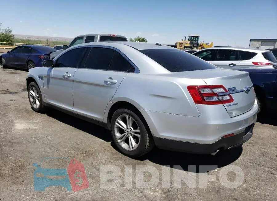 1FAHP2E88JG114125 Photo# 2