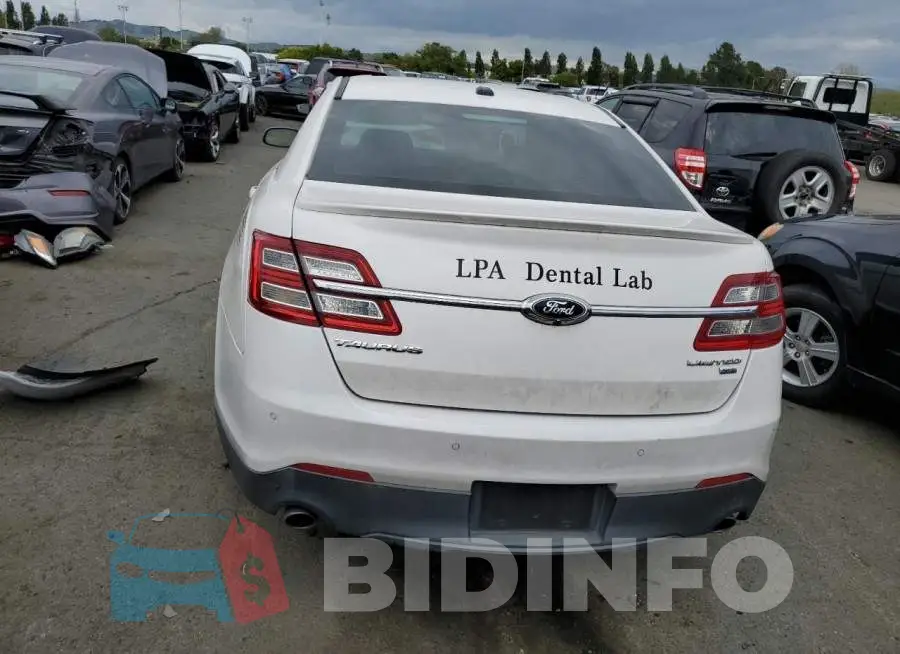 1FAHP2J88EG134645 Photo# 6