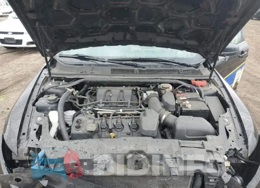 1FAHP2MKXGG116111 Photo# 11