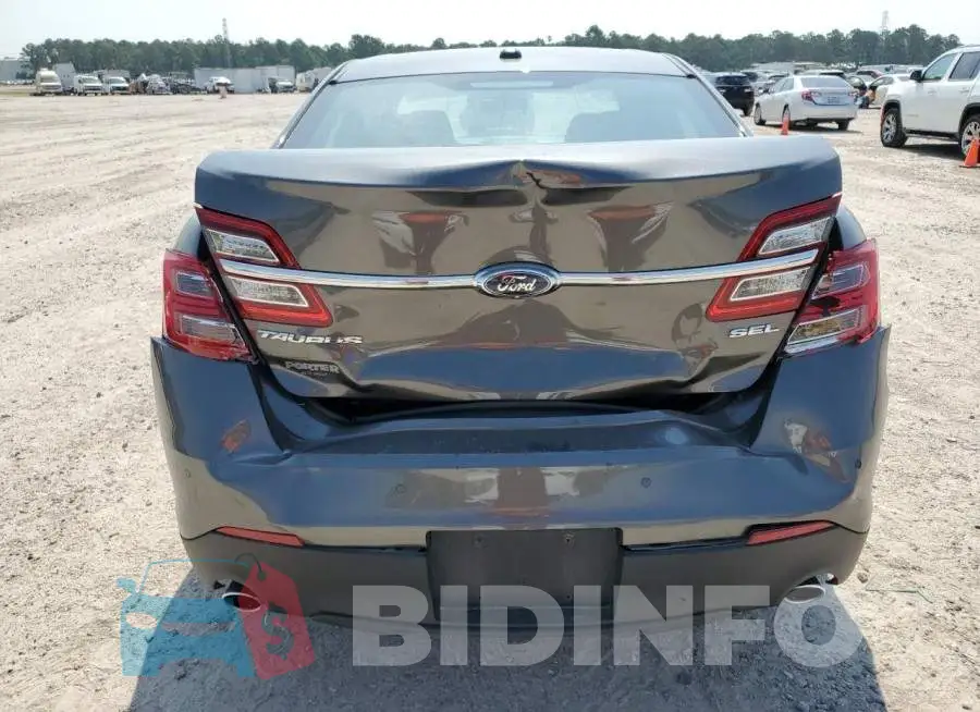 1FAHP2E85JG137619 Photo# 6