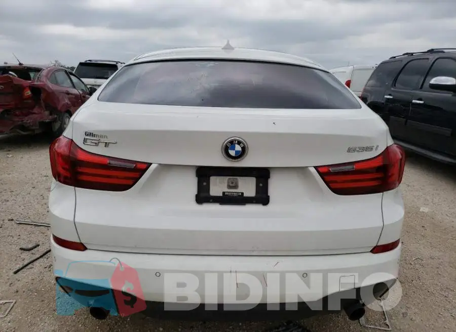 WBA5M2C57ED085638 Photo# 6