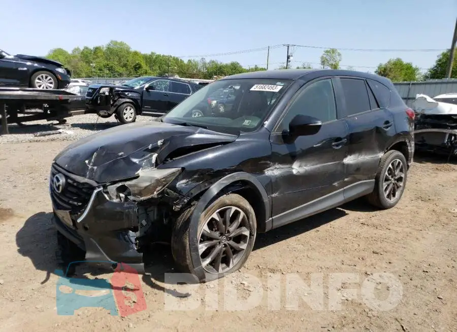 JM3KE4DYXG0780947 Photo# 1