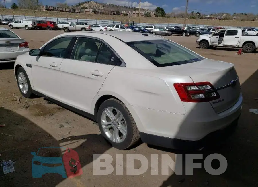 1FAHP2E85JG112235 Photo# 2