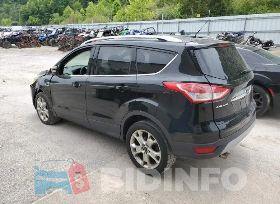 1FMCU0JX2GUA51852 Photo# 2