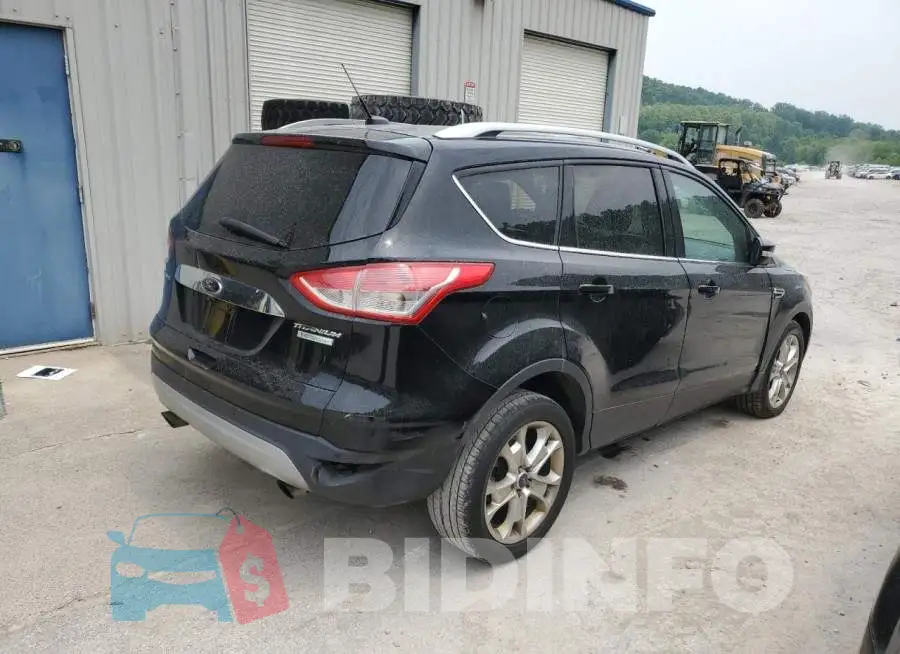 1FMCU0JX2GUA51852 Photo# 3