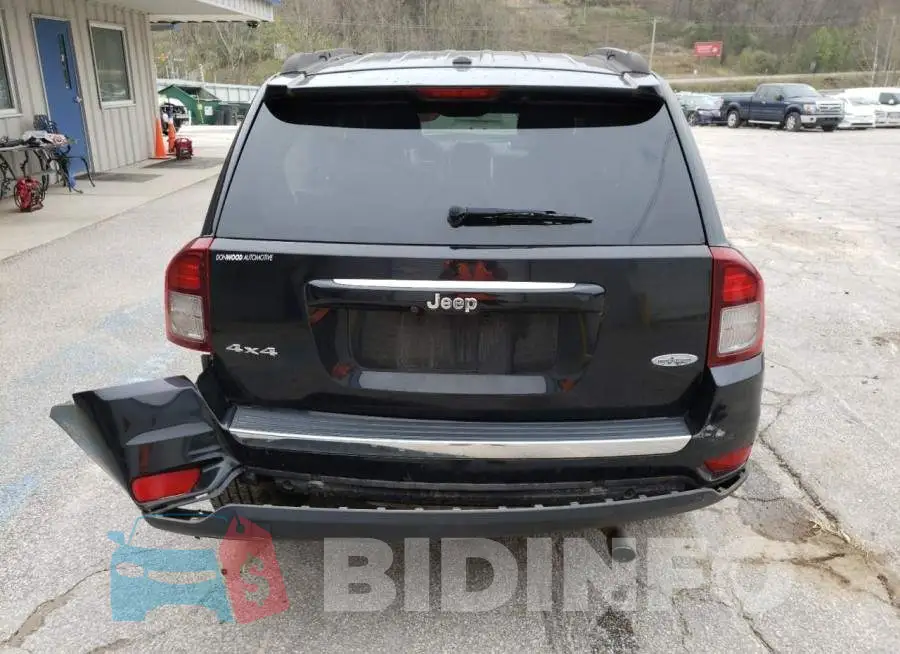 1C4NJDEB4GD559123 Photo# 6