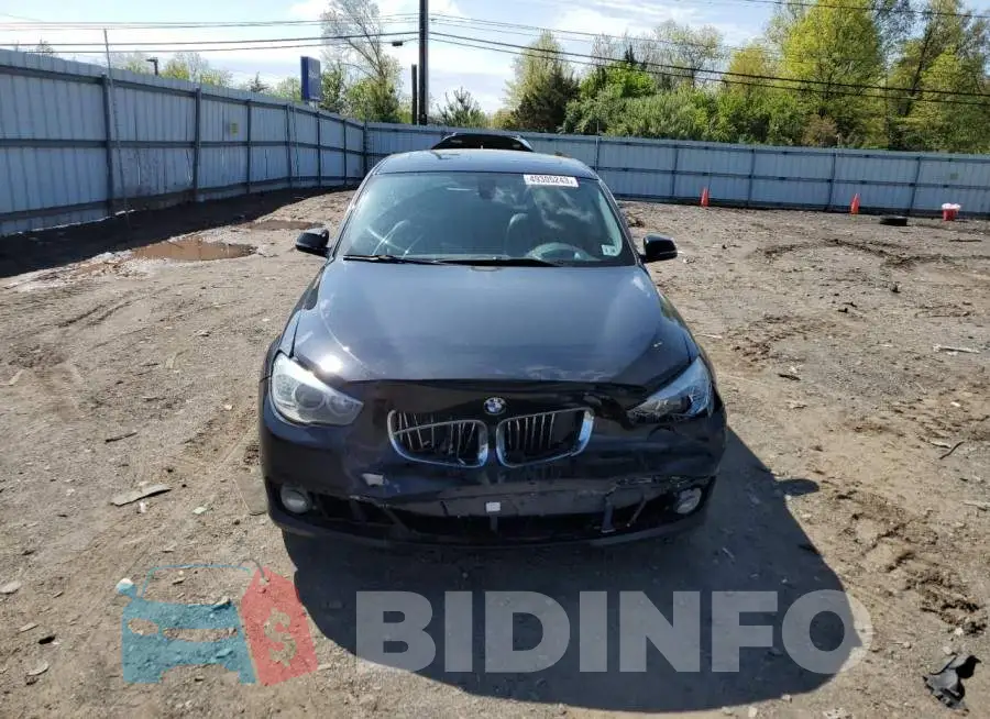 WBA5M4C53FD184132 Photo# 5