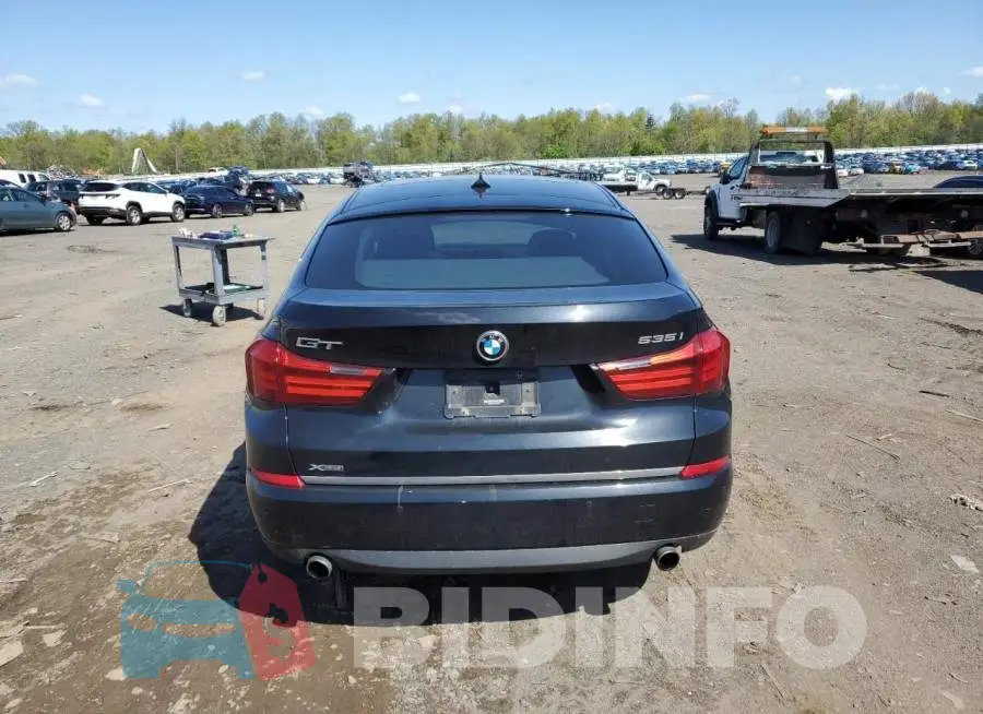 WBA5M4C53FD184132 Photo# 6
