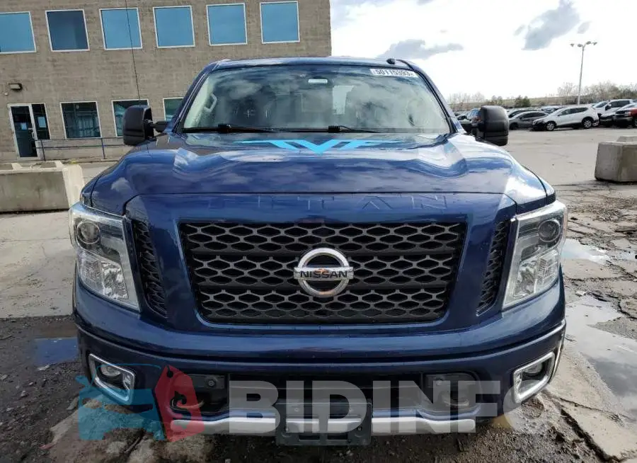 1N6AA1E52JN518527 Photo# 5
