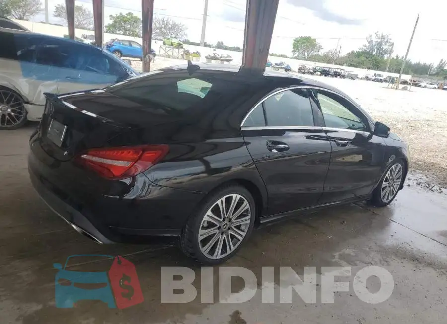 WDDSJ4EB9JN650821 Photo# 3