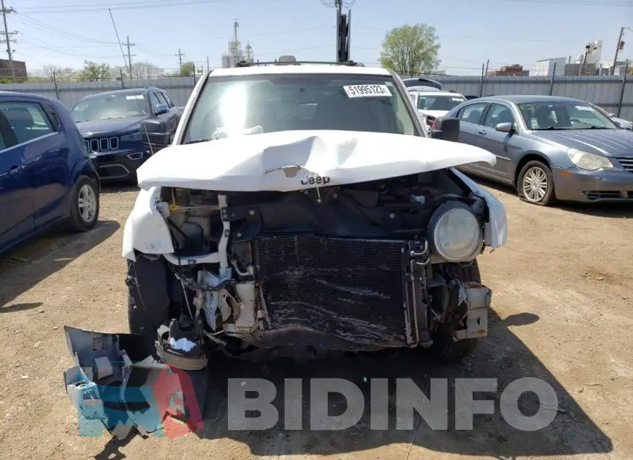 1C4NJPFB9FD110826 Photo# 5