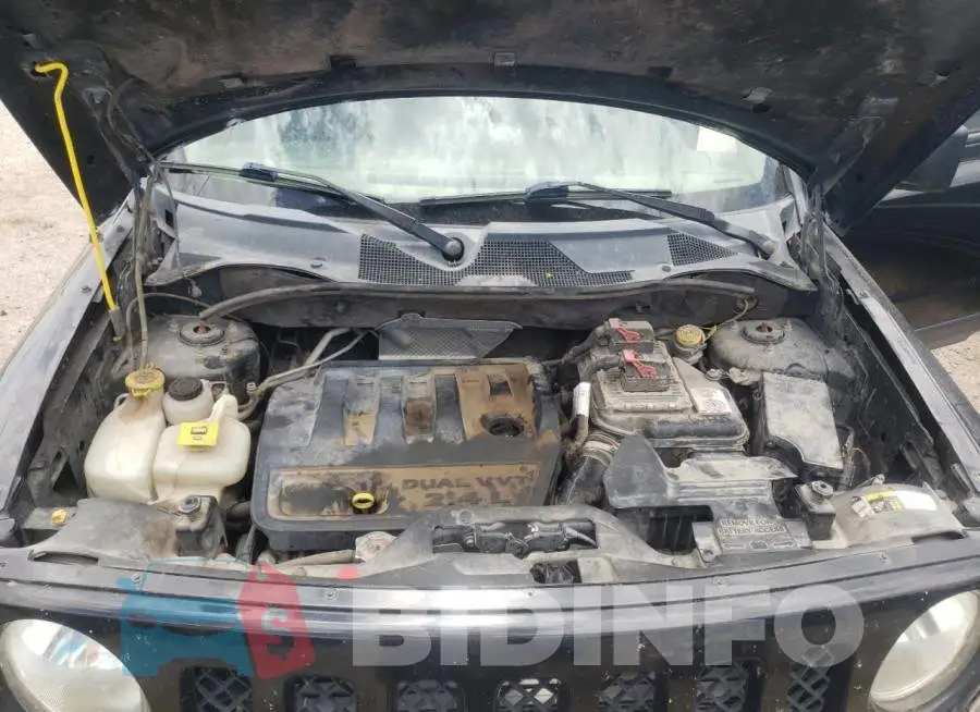 1C4NJPBB4GD698299 Photo# 11