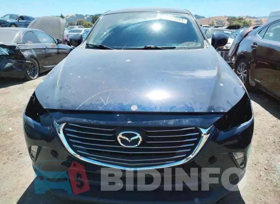 JM1DKBD78G0111548 Photo# 5