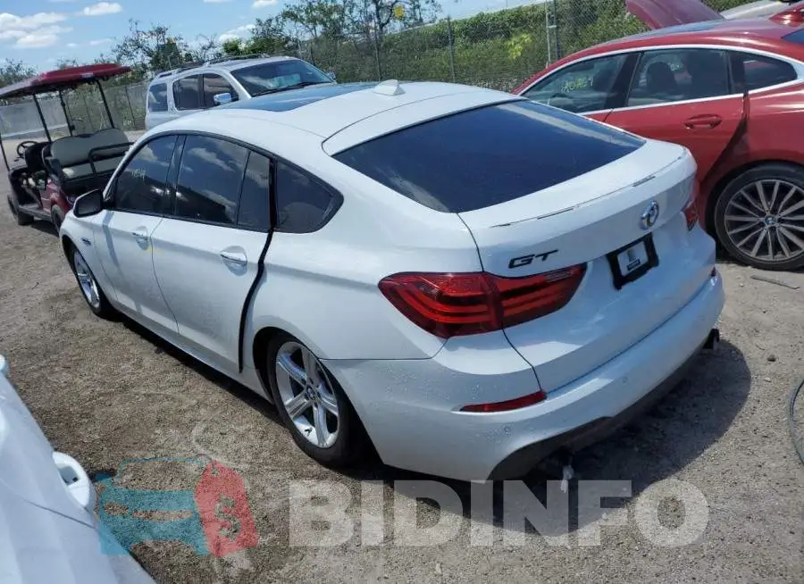 WBA5M2C5XGG498915 Photo# 2