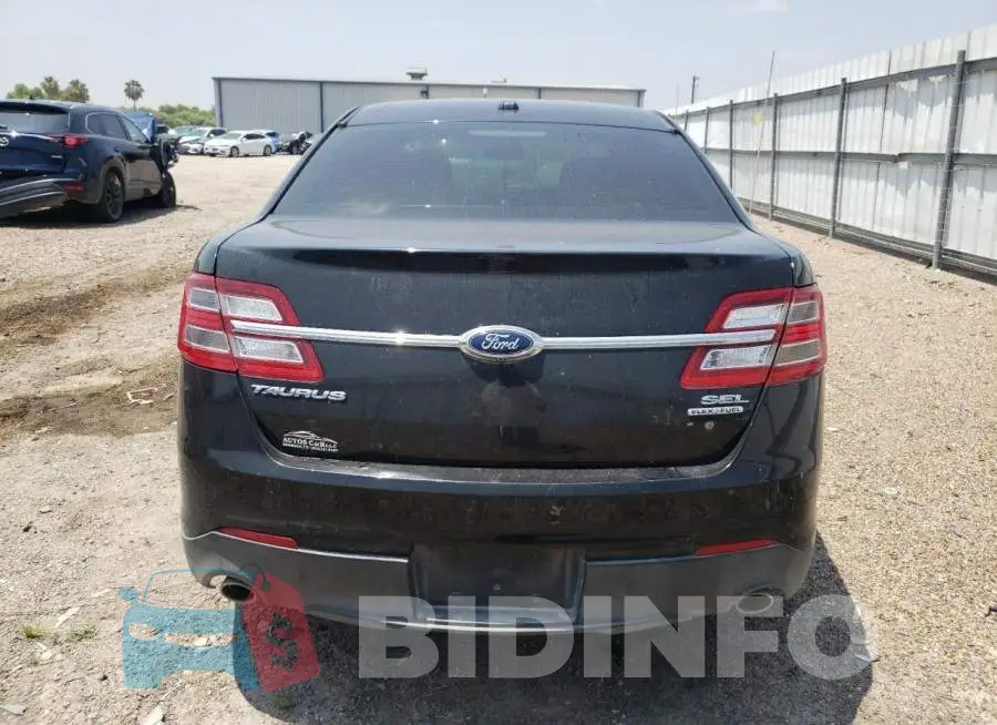 1FAHP2E82FG151002 Photo# 6