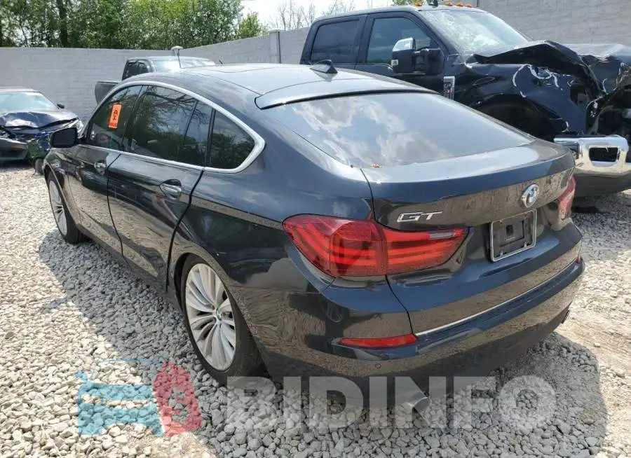 WBA5M2C55FGH99271 Photo# 2