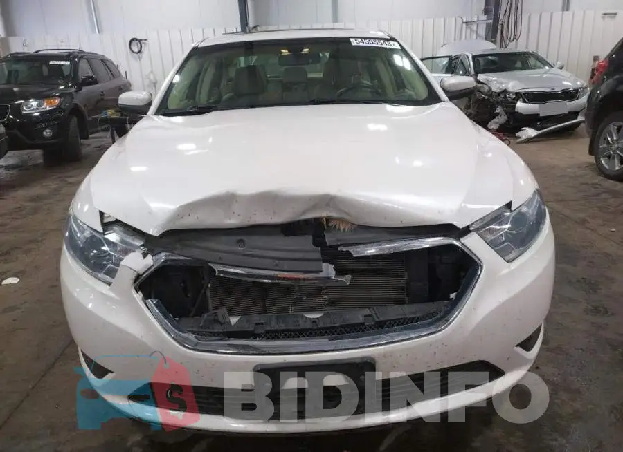1FAHP2E84EG137911 Photo# 5