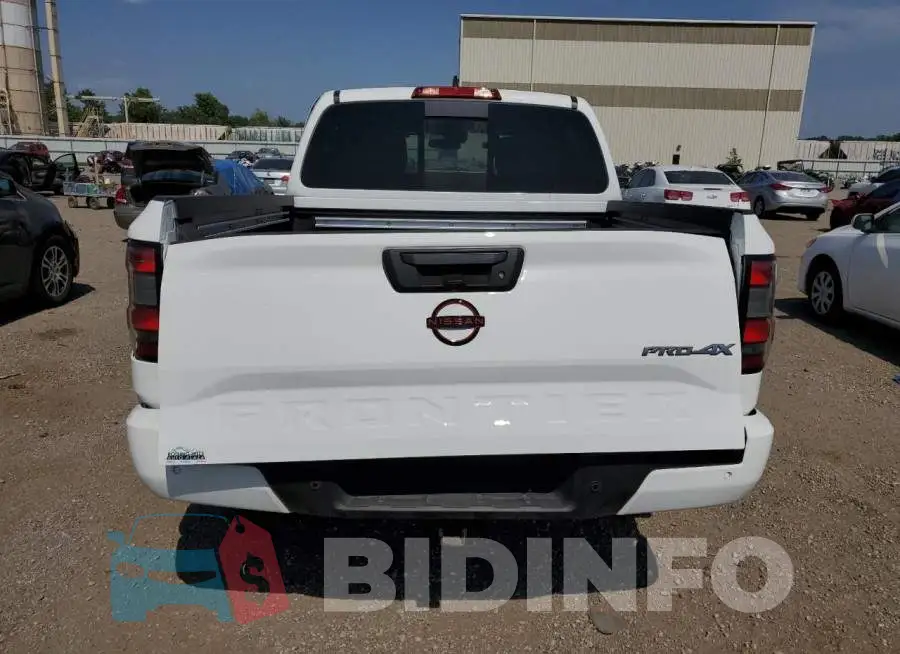 1N6ED1EK7PN637052 Photo# 6