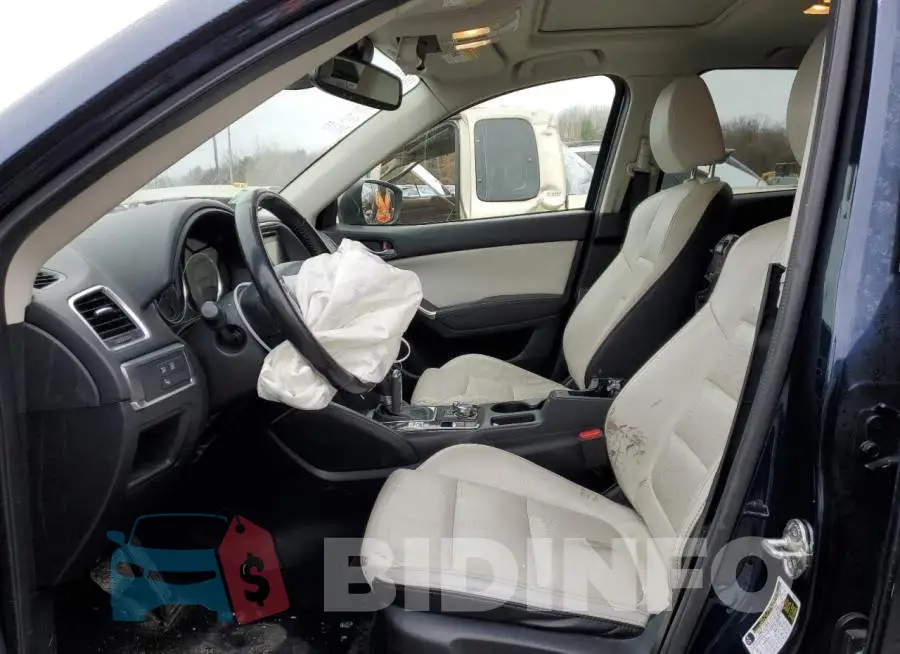 JM3KE4DY2G0731077 Photo# 7