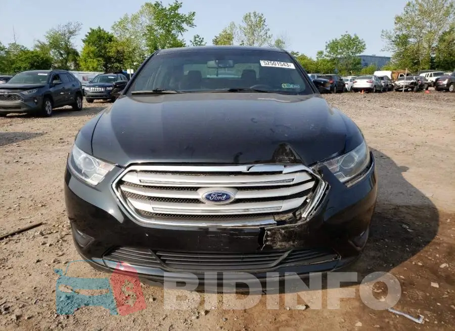 1FAHP2E8XFG128552 Photo# 5