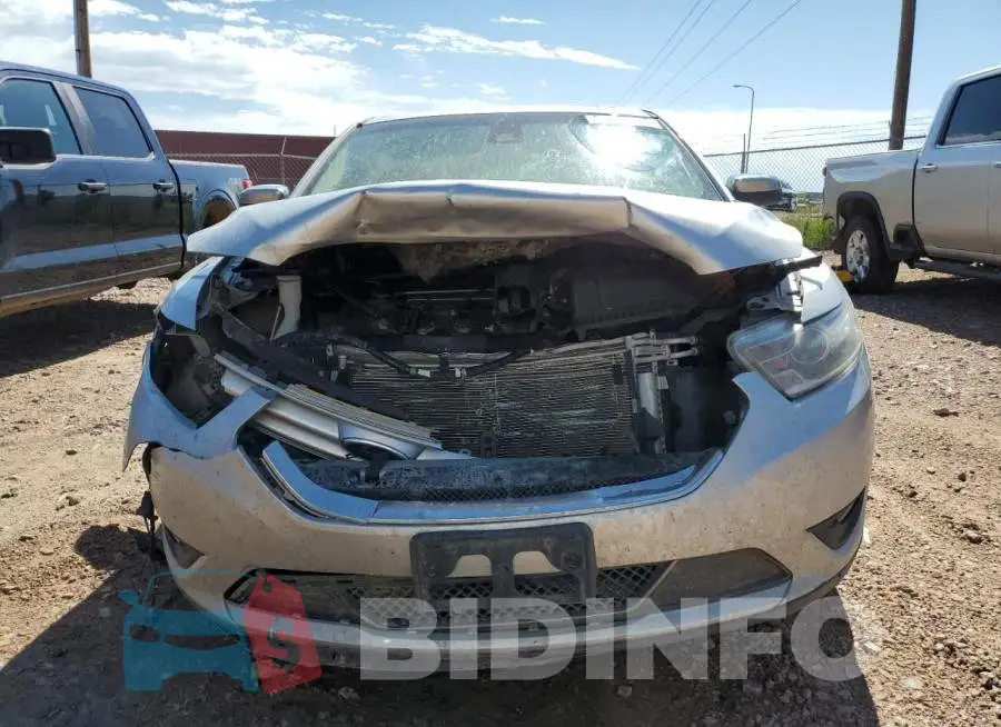 1FAHP2F8XEG167834 Photo# 5