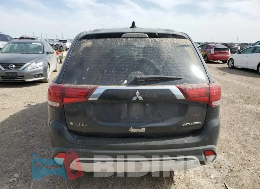 JA4AD2A31KZ006606 Photo# 6
