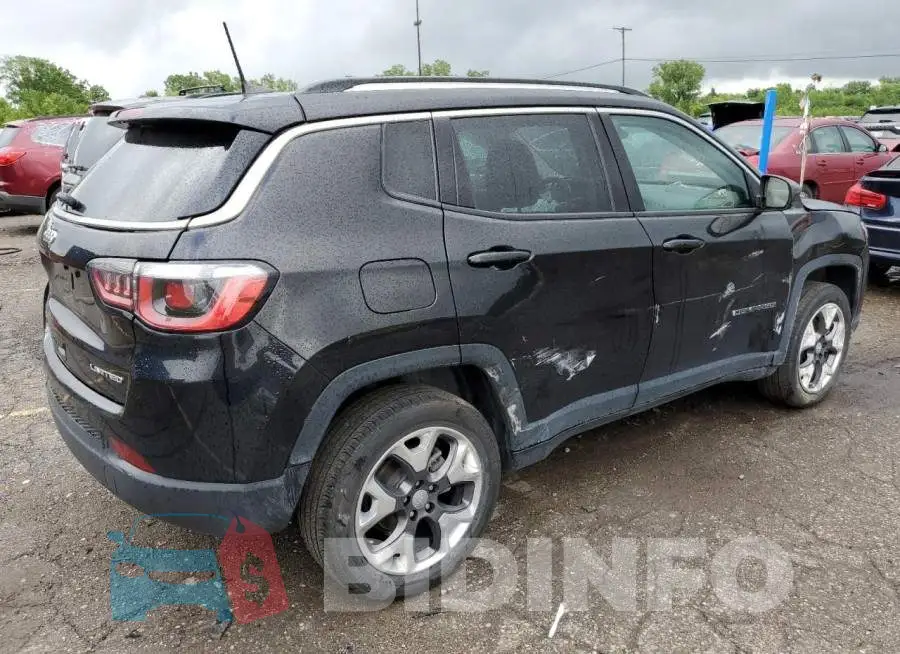 3C4NJDCB3KT734015 Photo# 3