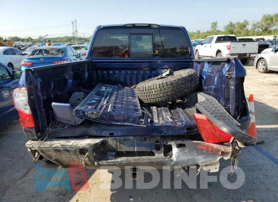 1N6AA1E52JN545145 Photo# 6