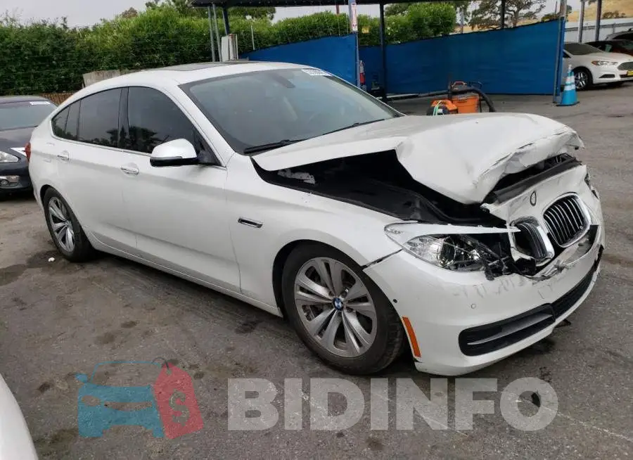 WBA5M2C57ED085624 Photo# 4