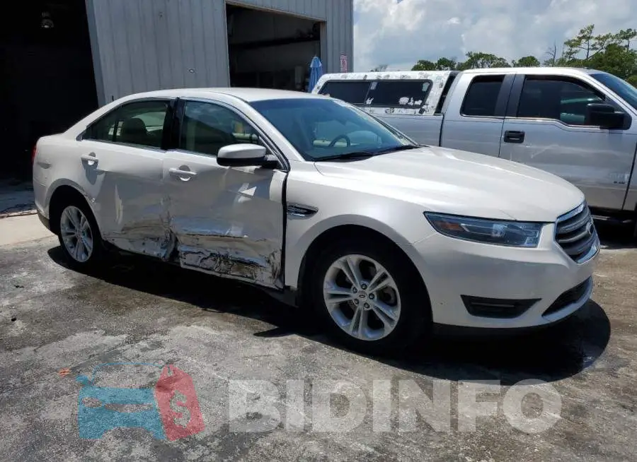 1FAHP2E86FG131562 Photo# 4