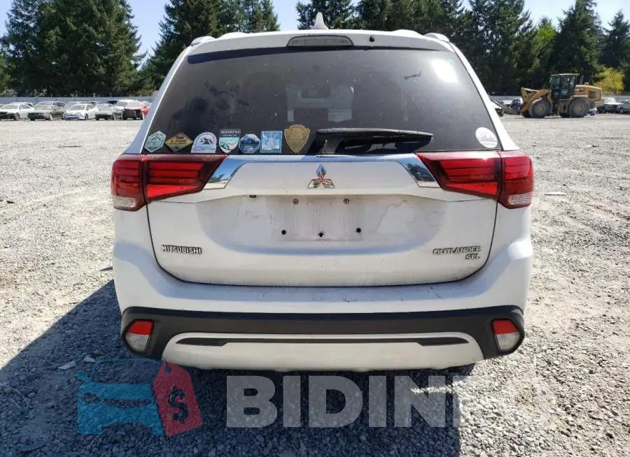 JA4AD3A35KZ010826 Photo# 6