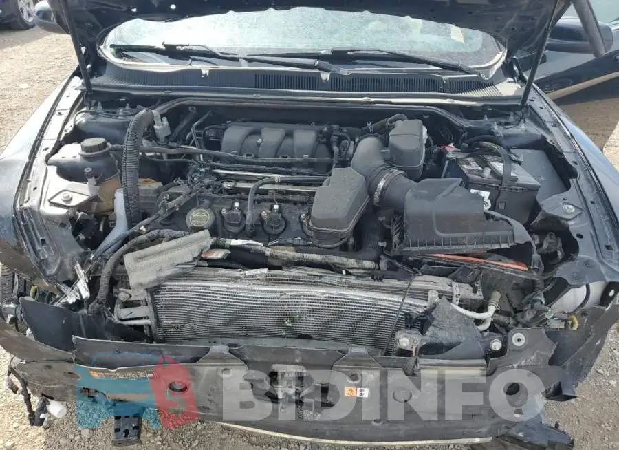 1FAHP2E86JG127908 Photo# 11