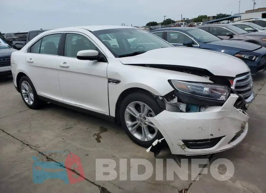 1FAHP2E84FG130281 Photo# 4