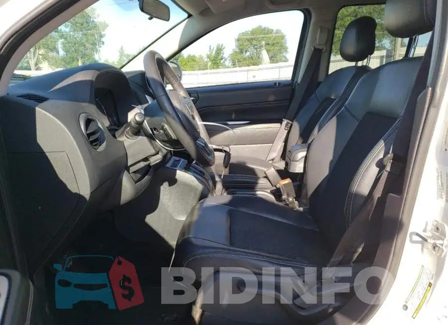 1C4NJDEBXED734777 Photo# 7