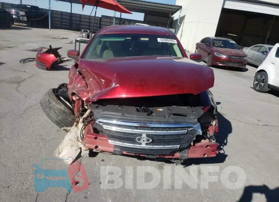1FAHP2E8XGG158149 Photo# 5
