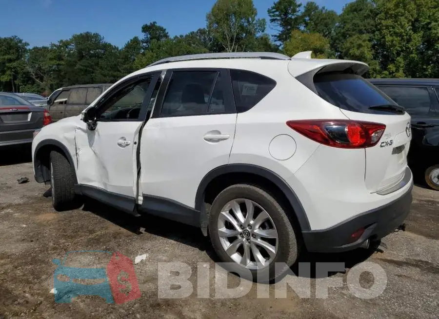 JM3KE2DY4F0527058 Photo# 2