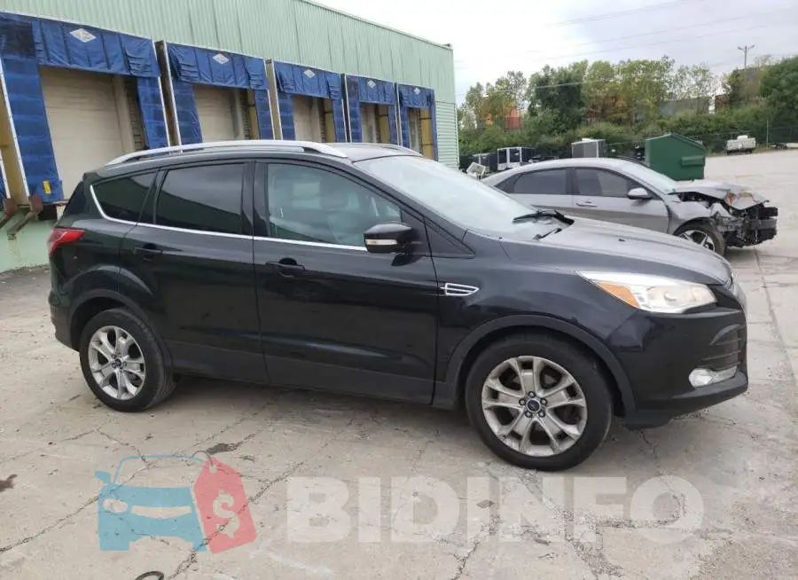 1FMCU0JX2EUB34095 Photo# 4