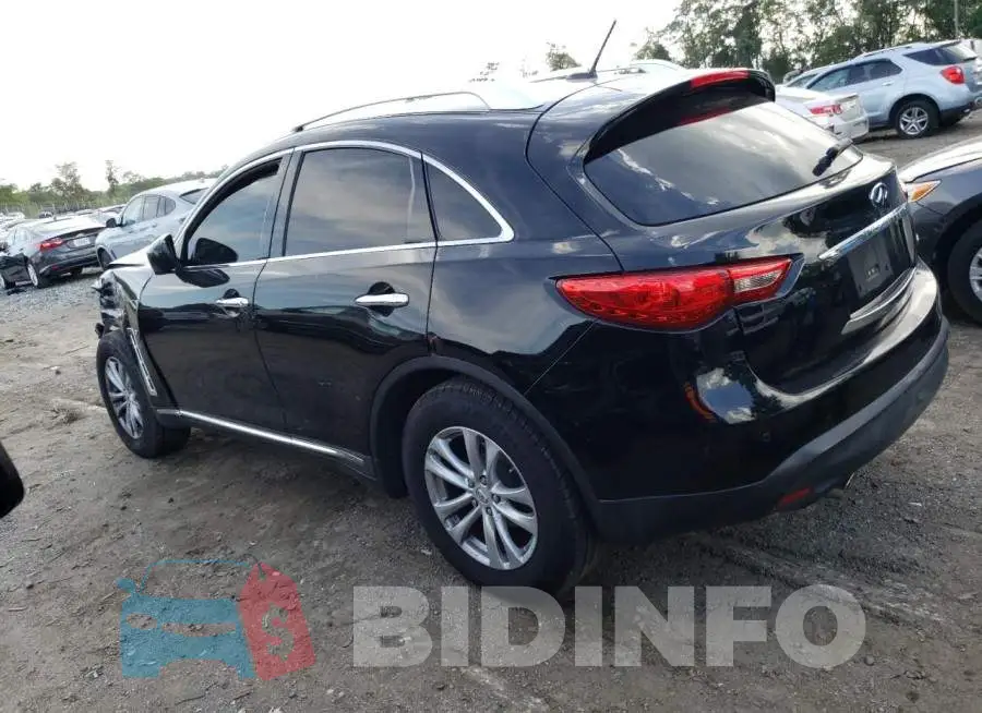 JN8CS1MWXEM412832 Photo# 2