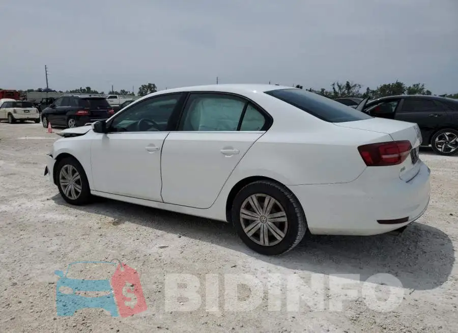 3VW2B7AJ2HM384579 Photo# 2