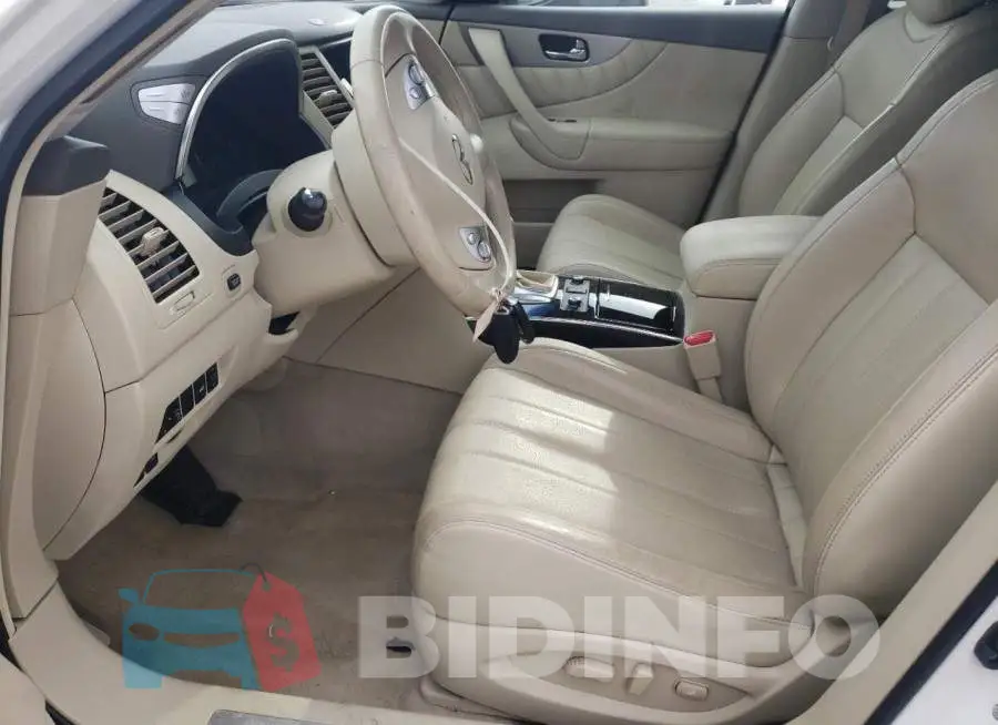 JN8CS1MU2HM141607 Photo# 7