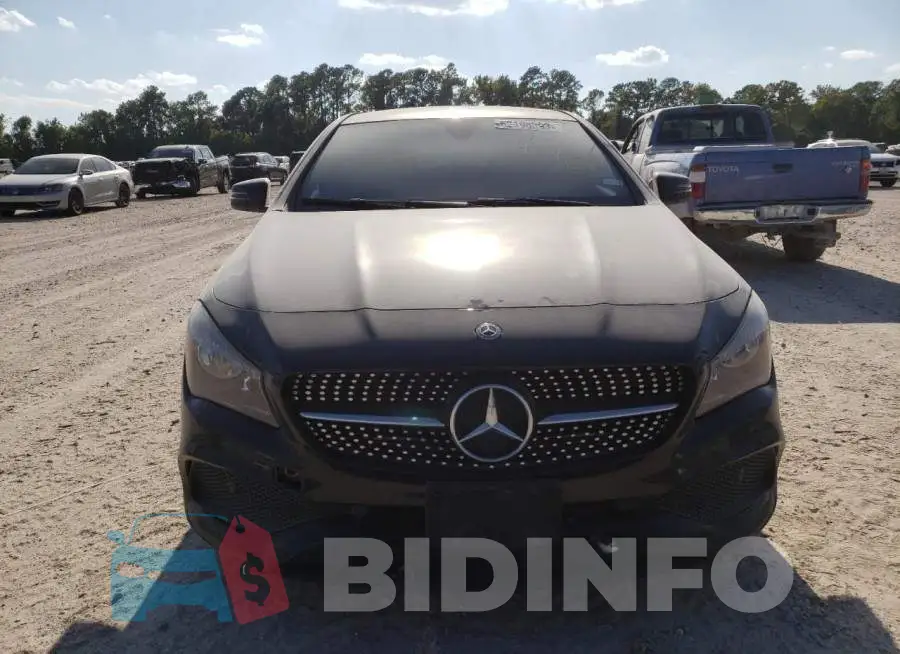 WDDSJ4EB2JN600911 Photo# 5