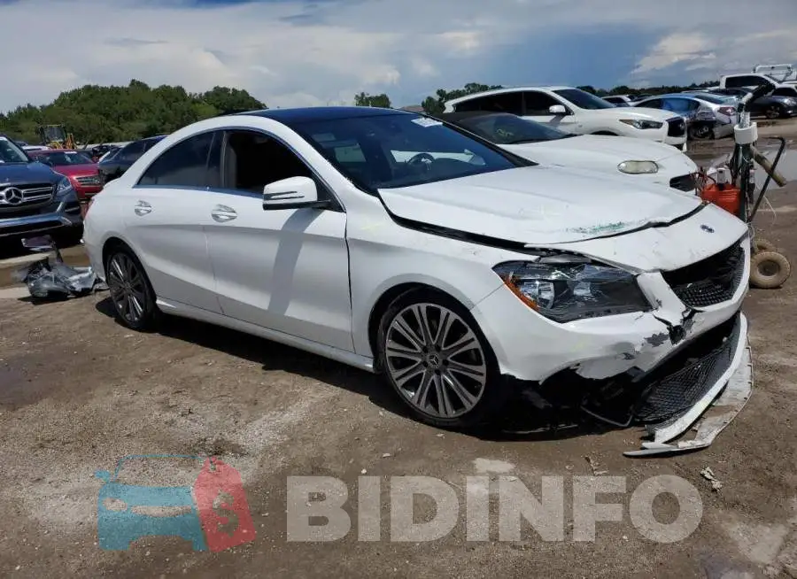 WDDSJ4EB1JN677303 Photo# 4