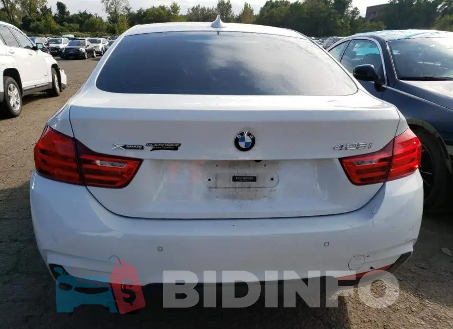 WBA4C9C56GG141111 Photo# 6