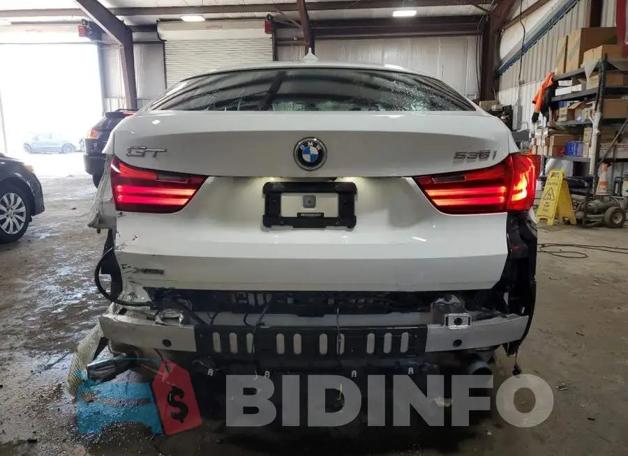 WBA5M4C52ED183472 Photo# 6