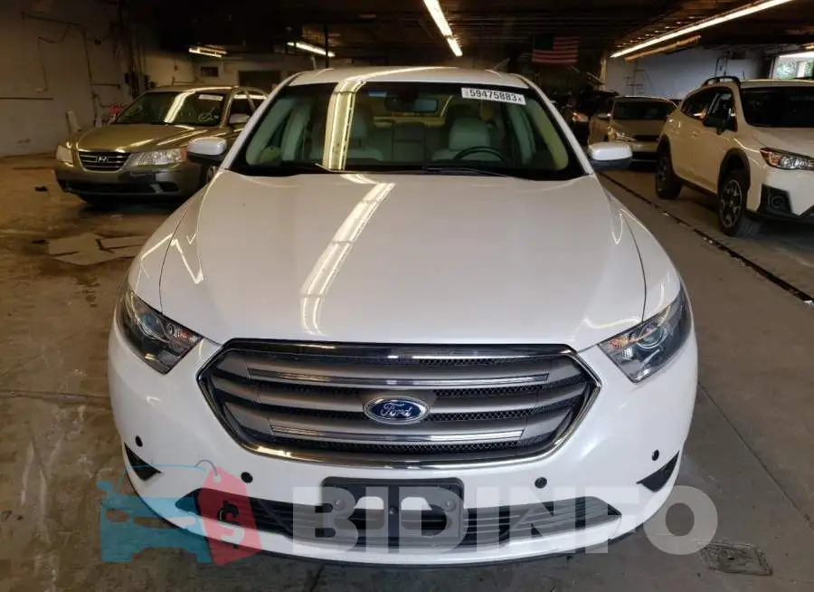 1FAHP2E85EG125248 Photo# 5