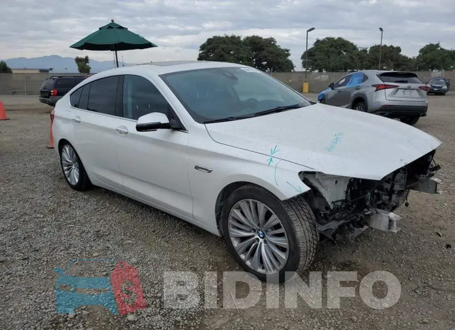 WBA5M2C5XGG499076 Photo# 4