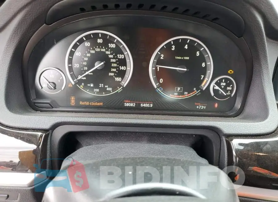 WBA5M2C5XGG499076 Photo# 9
