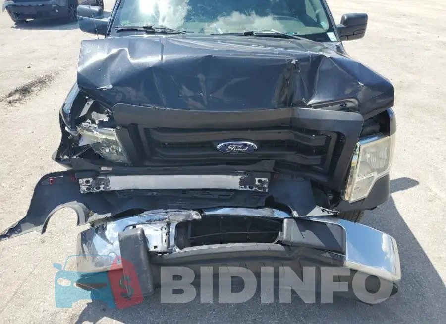 1FTMF1CMXEKF77070 Photo# 11